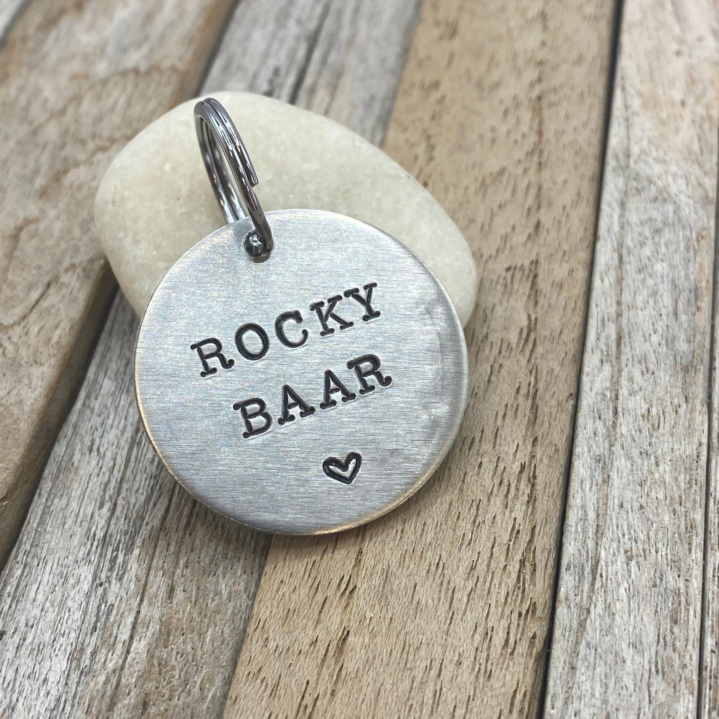 Handgestempelde dierenpenning goud of zilver