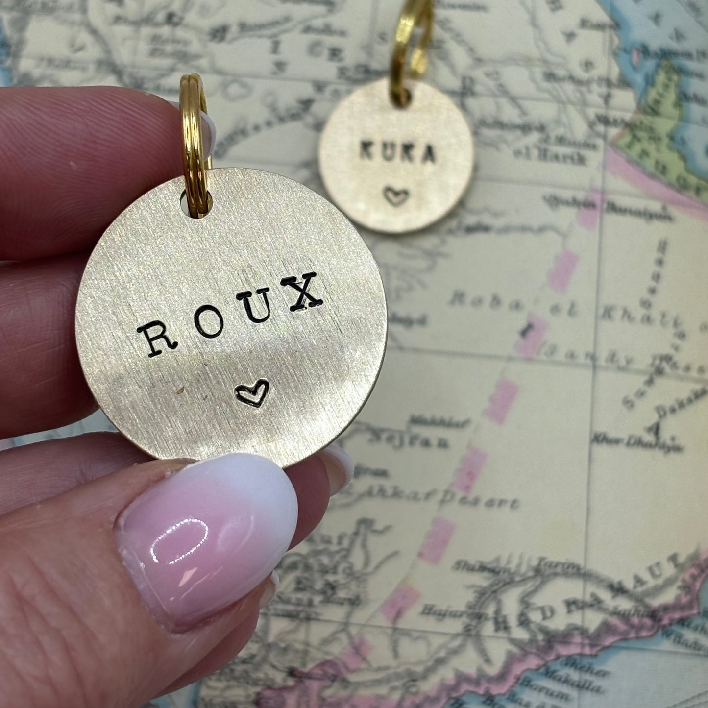 Handgestempelde dierenpenning goud of zilver