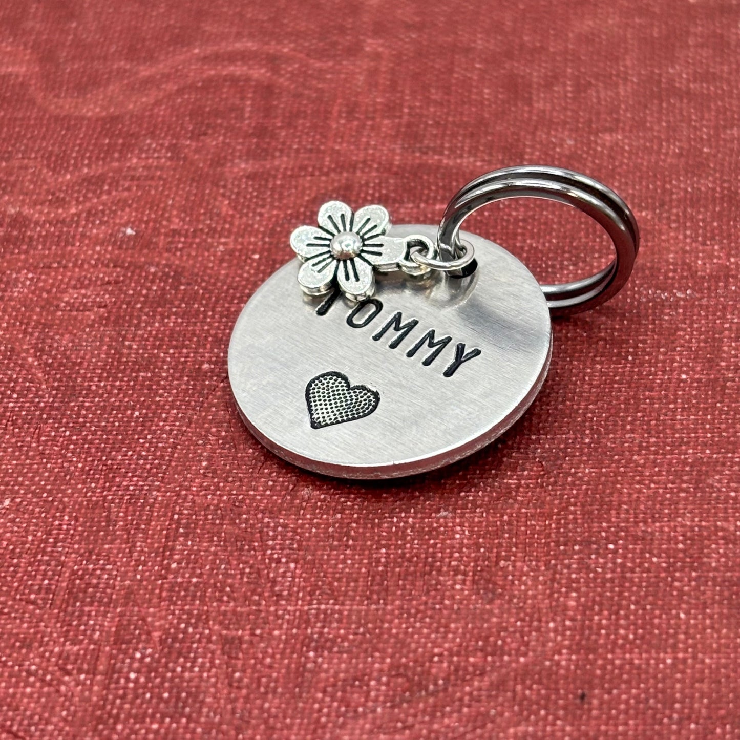 Dog tag, double-sided, hand-stamped with a silver flower charm 