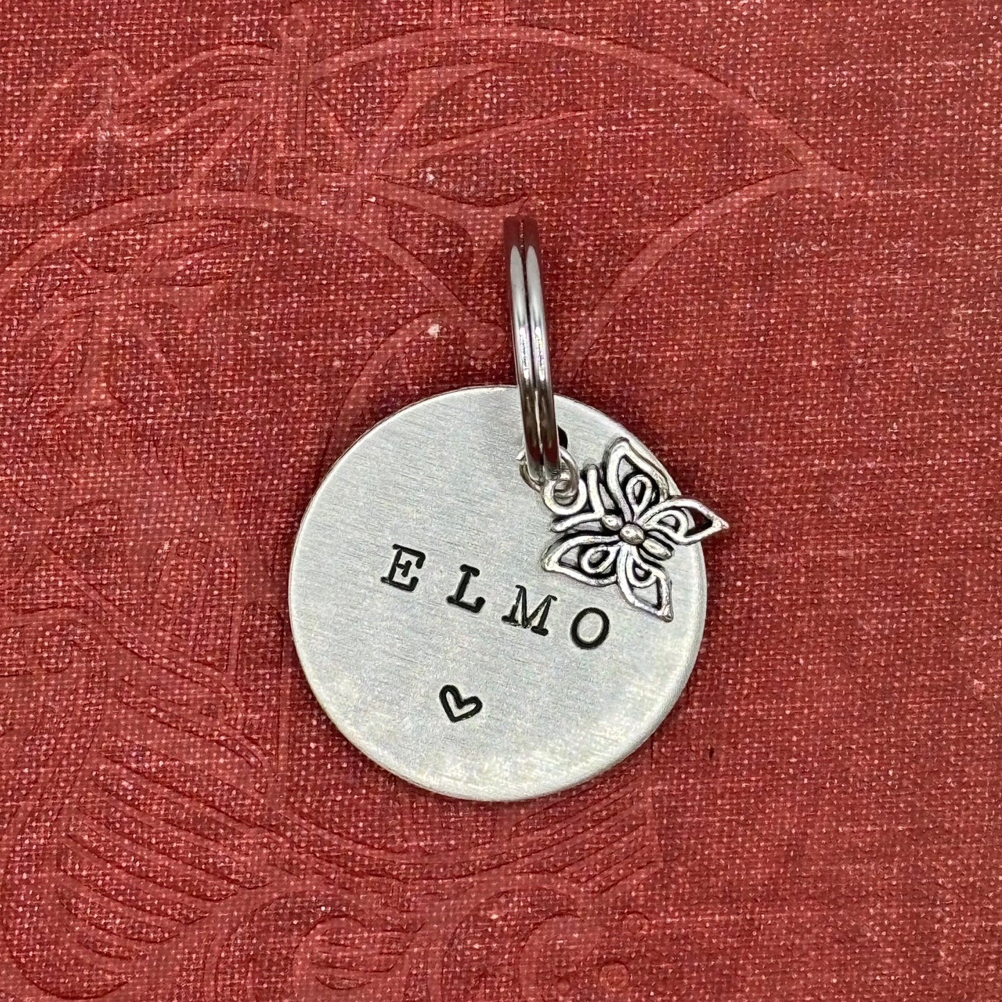 Dog tag, double-sided, hand-stamped with a silver butterfly charm 