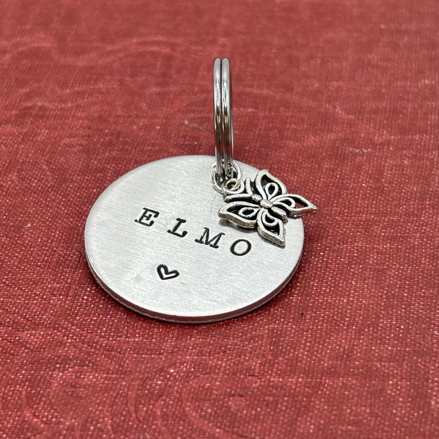 Dog tag, double-sided, hand-stamped with a silver butterfly charm 